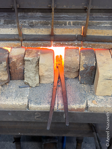 Heating the jaws in the forge